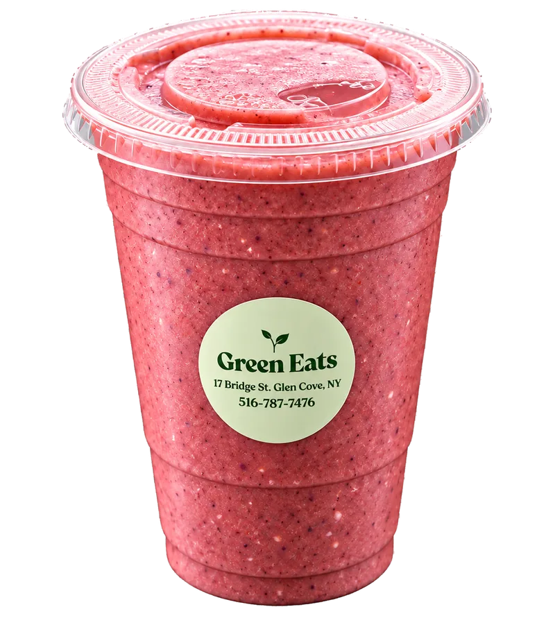 A pink Green Eats smoothie in a branded cup